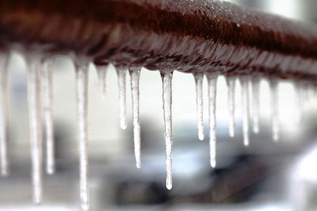 How To Winterize Your Plumbing Pipes - frozen plumbing pipes in winter